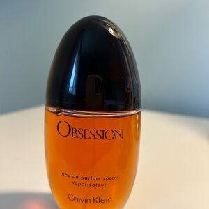 Calvin Klein Obsession Perfume in Black and Orange